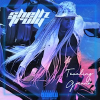 a woman in a hat is sitting on a motorcycle