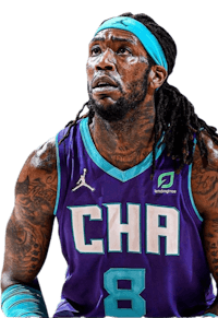 a man with dreadlocks wearing a purple jersey